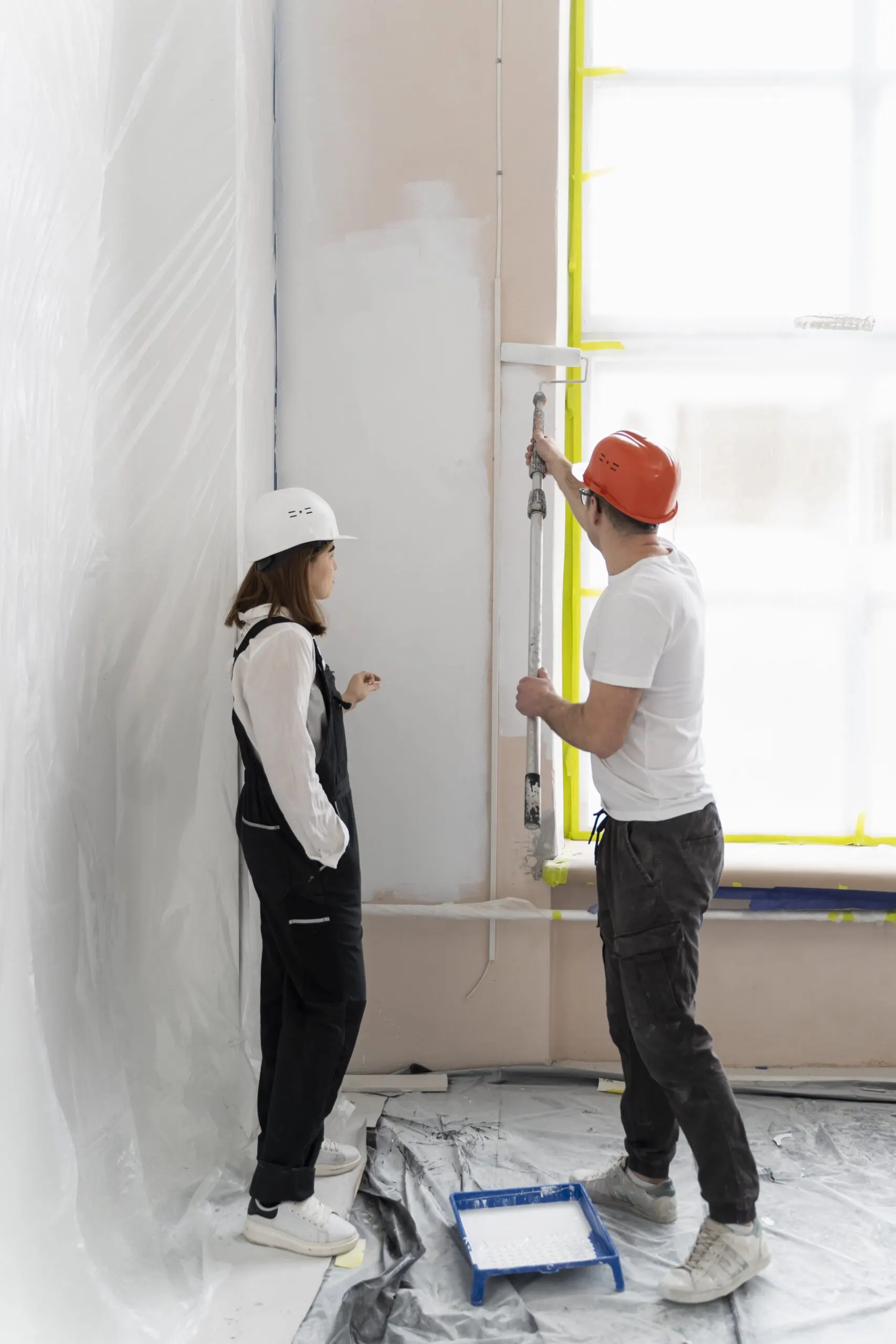full-shot-people-painting-walls-min-scaled-1